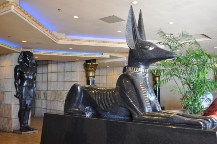 A statue of Anubis guarding the entrance to a Casino